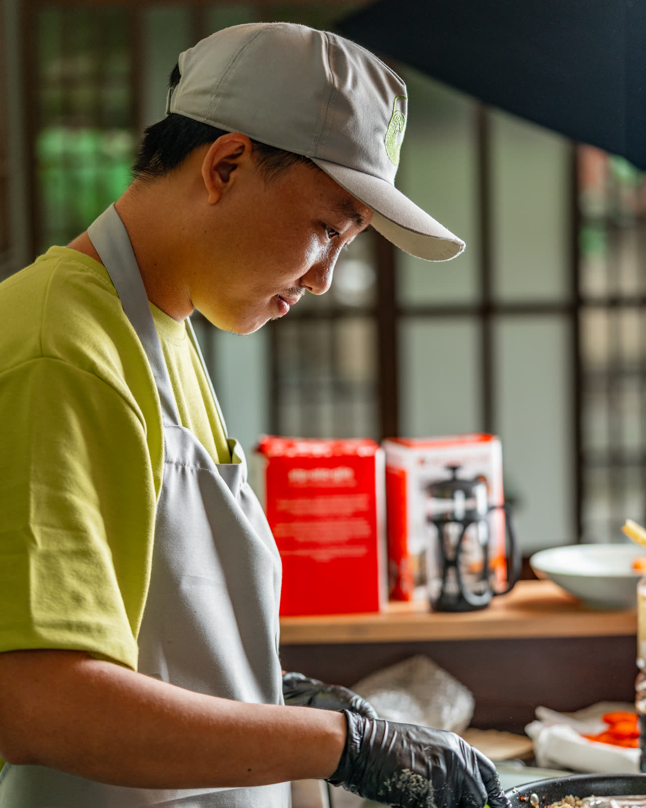 An Abokado chef working the sushi counter
